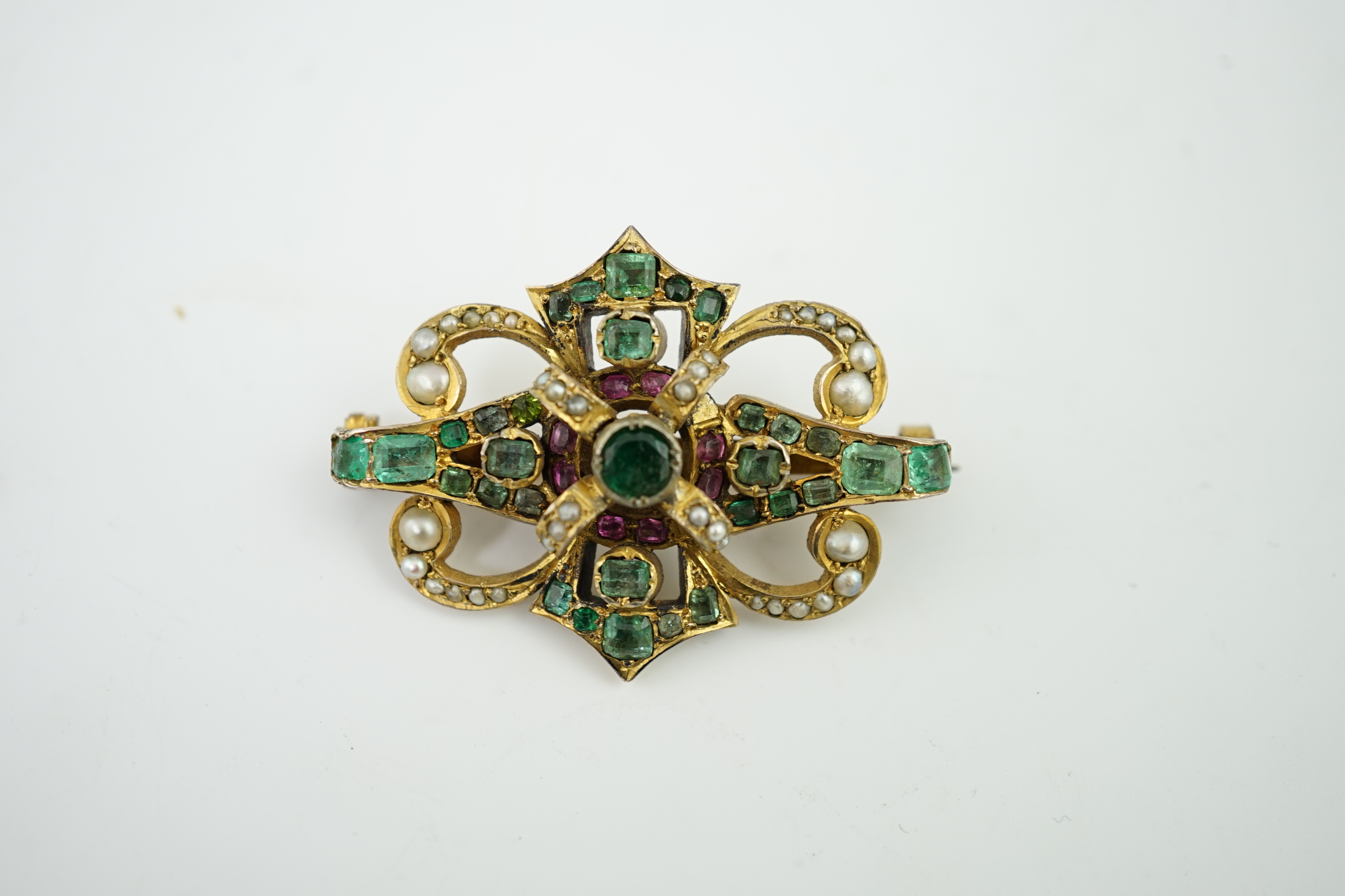 A Victorian gold, emerald, garnet? and graduated seed pearl cluster set brooch, in the Suffragette colours